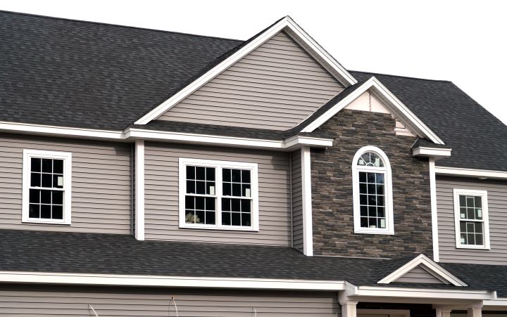 Residential home with newly installed siding and windows